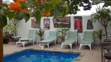 Outdoor pool, pool umbrellas, pool loungers