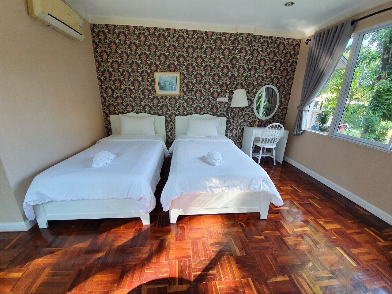 honey twin bed | minibar, desk, blackout curtains, rollaway beds