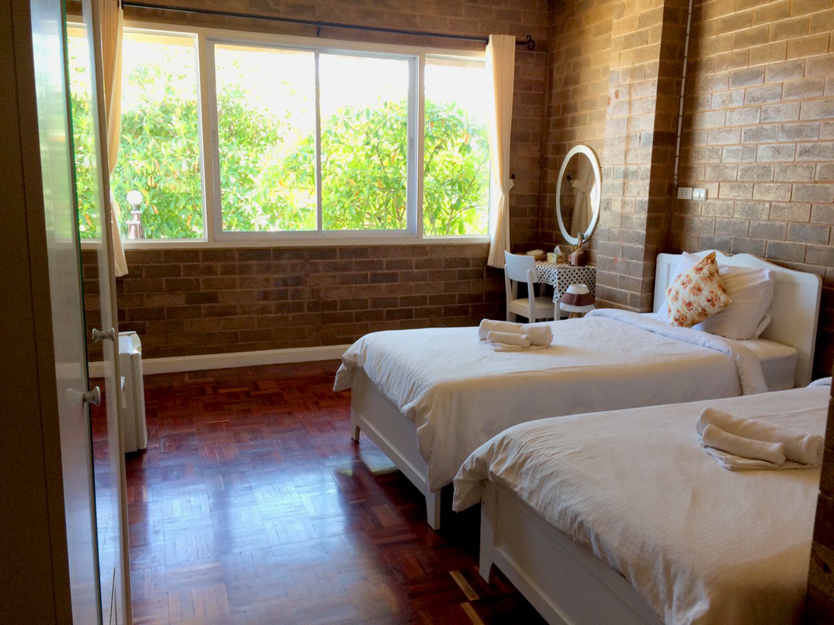 honey twin bed | minibar, desk, blackout curtains, rollaway beds