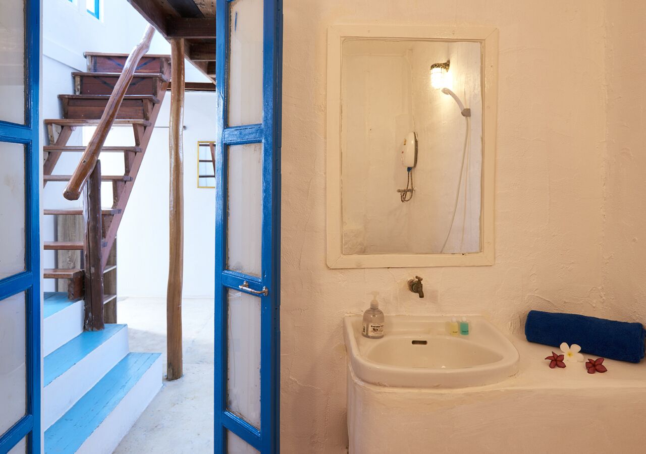 basic apartment, 2 bedrooms, garden view | bathroom | shower, free toiletries, towels