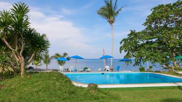 Outdoor pool, pool umbrellas, pool loungers