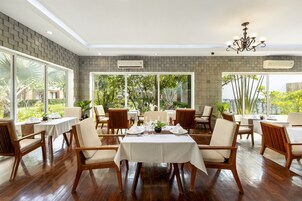 Breakfast, lunch, dinner served; international cuisine, pool views 