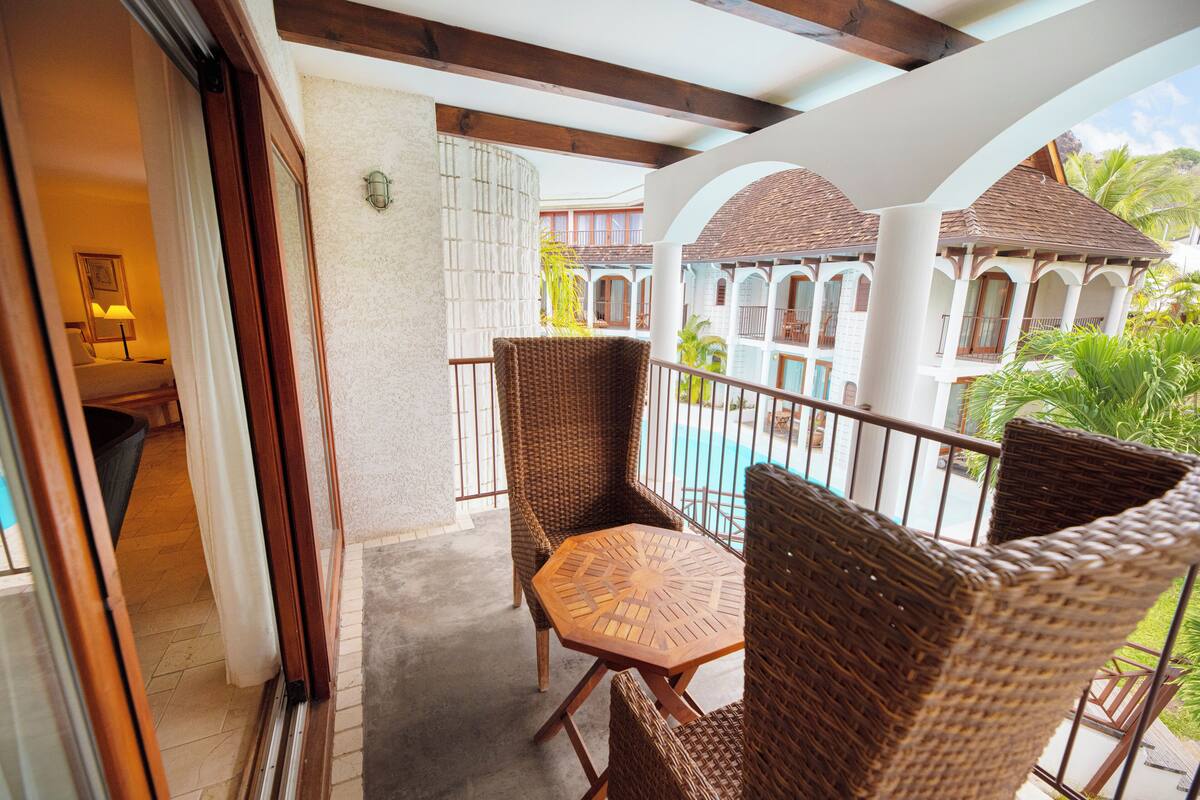 Junior Suite (With Pool Access) | Minibar, in-room safe, individually decorated, individually furnished