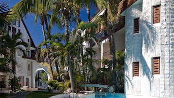2 outdoor pools, open 8:00 AM to 10:00 PM, pool umbrellas, pool loungers