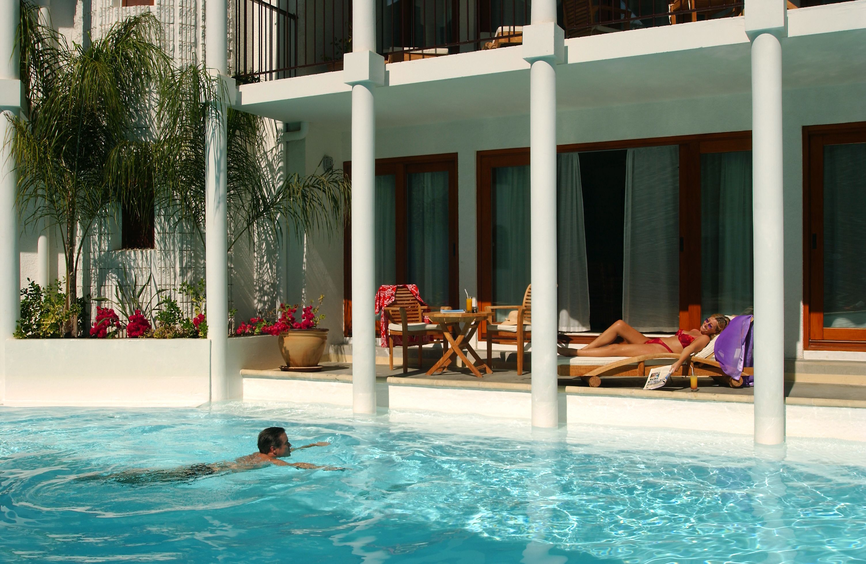 2 outdoor pools, open 8:00 am to 10:00 pm, pool umbrellas, pool loungers