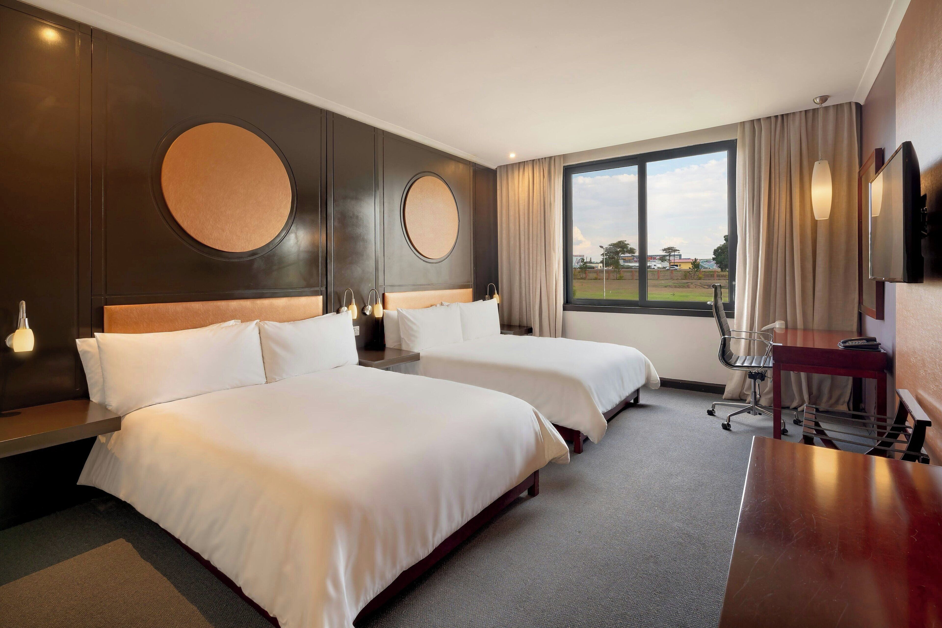 In-room safe, desk, iron/ironing board, free cribs/infant beds