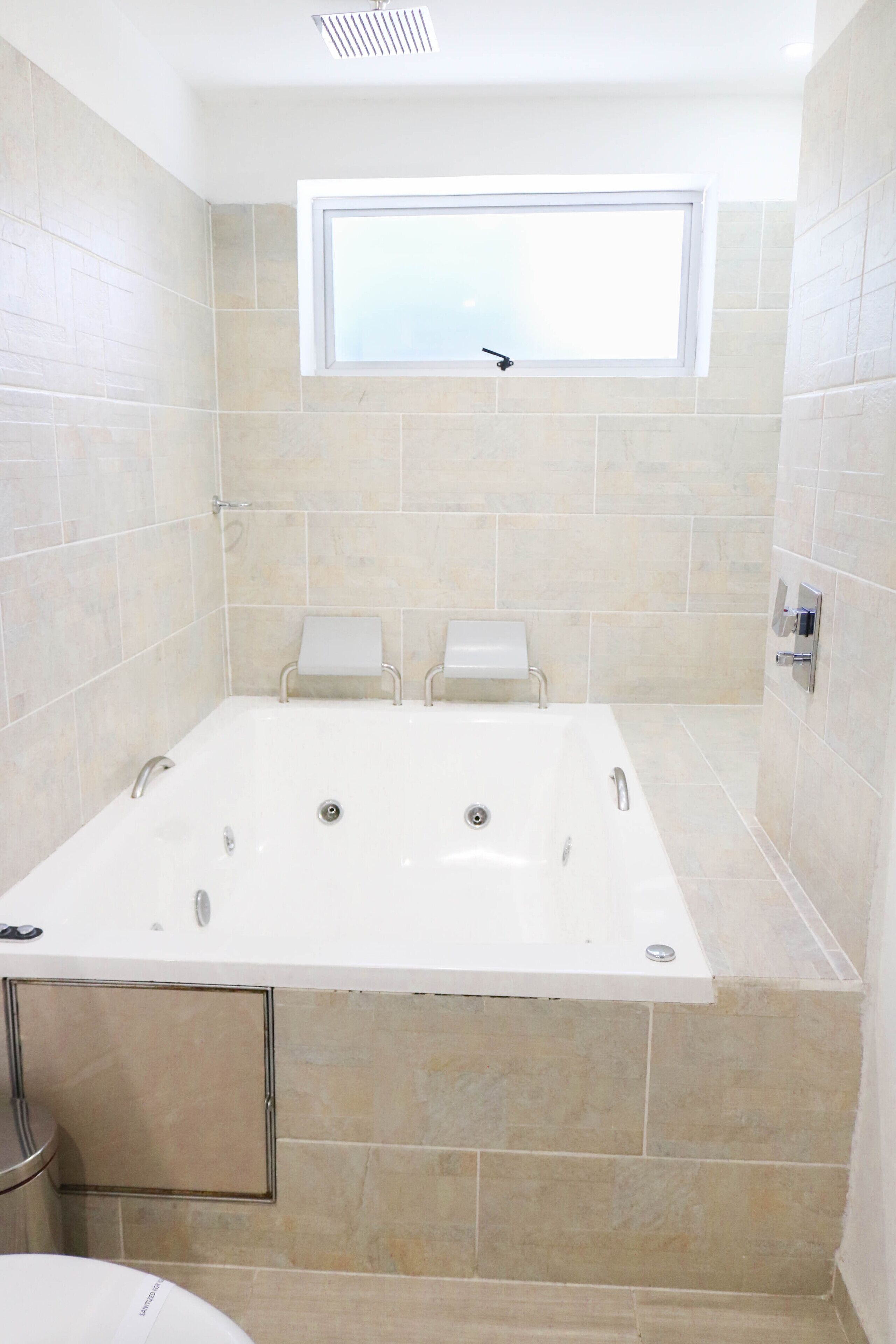 deluxe room, jetted tub | bathroom | free toiletries, hair dryer, towels