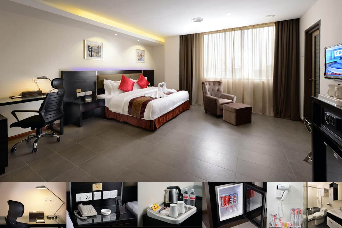 Chambre Affaires, 1 très grand lit | Minibar, coffres-forts dans les chambres, bureau
