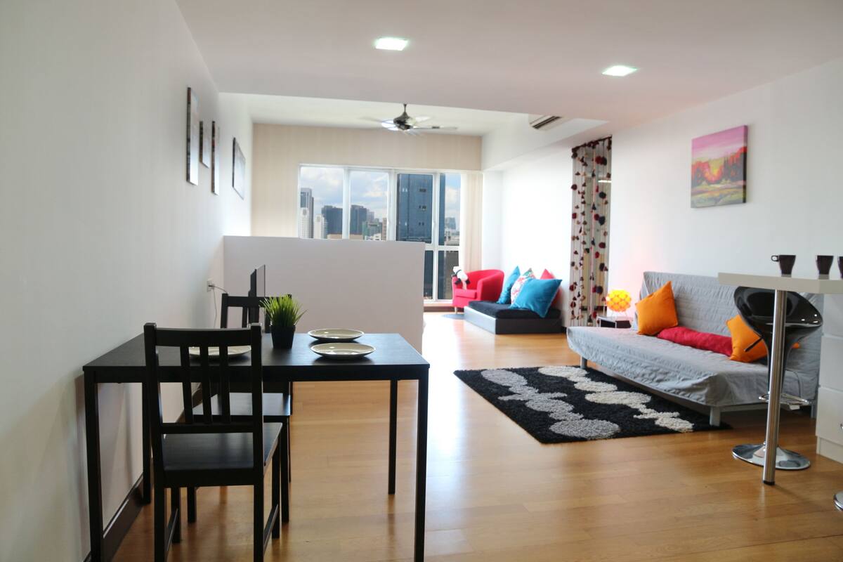 Studio (KLCC View) | Living room | Flat-screen TV