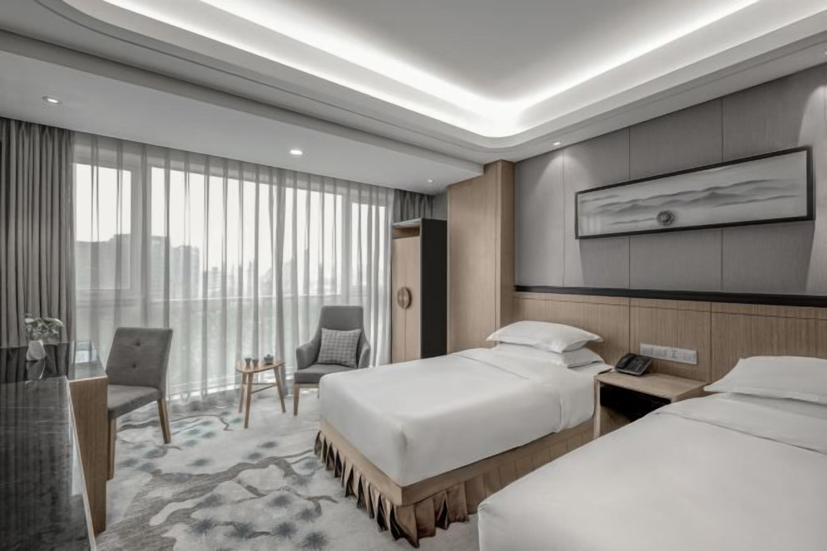 高档床上用品、羽绒被、迷你吧、客房内保险箱