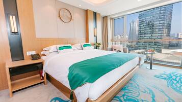 Premium bedding, down duvets, minibar, in-room safe