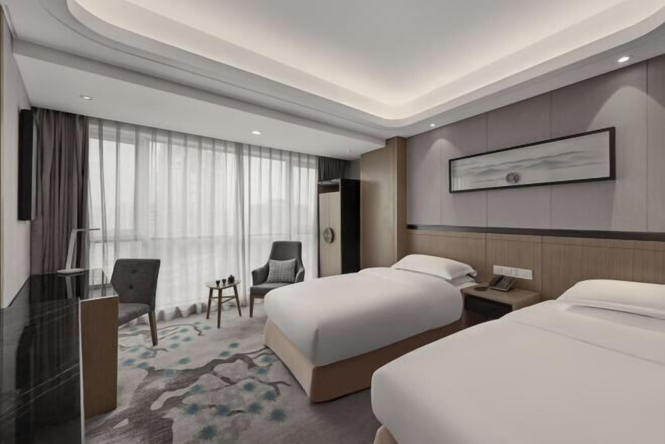 高档床上用品、羽绒被、迷你吧、客房内保险箱