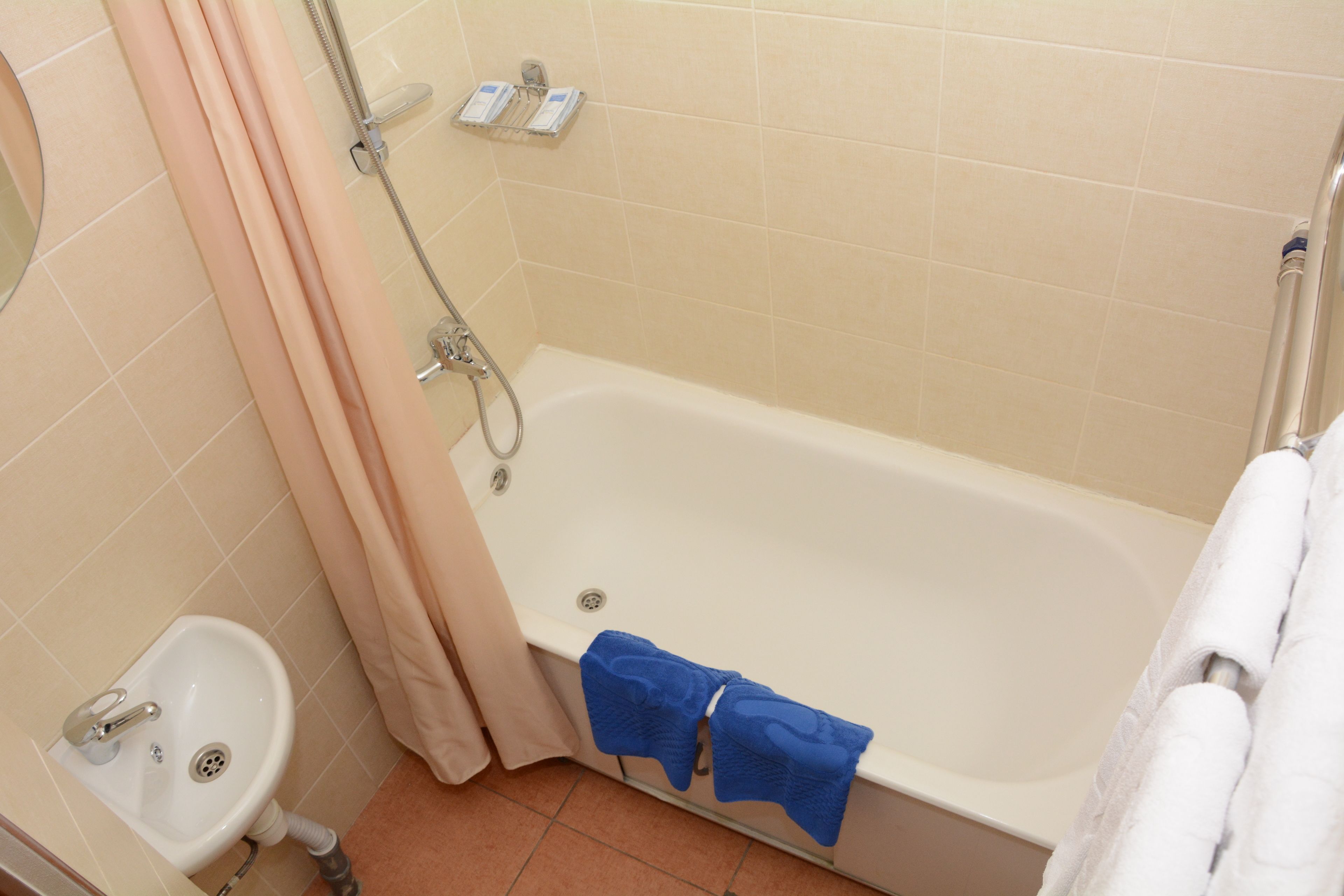 family room | bathroom | shower, free toiletries, hair dryer, towels