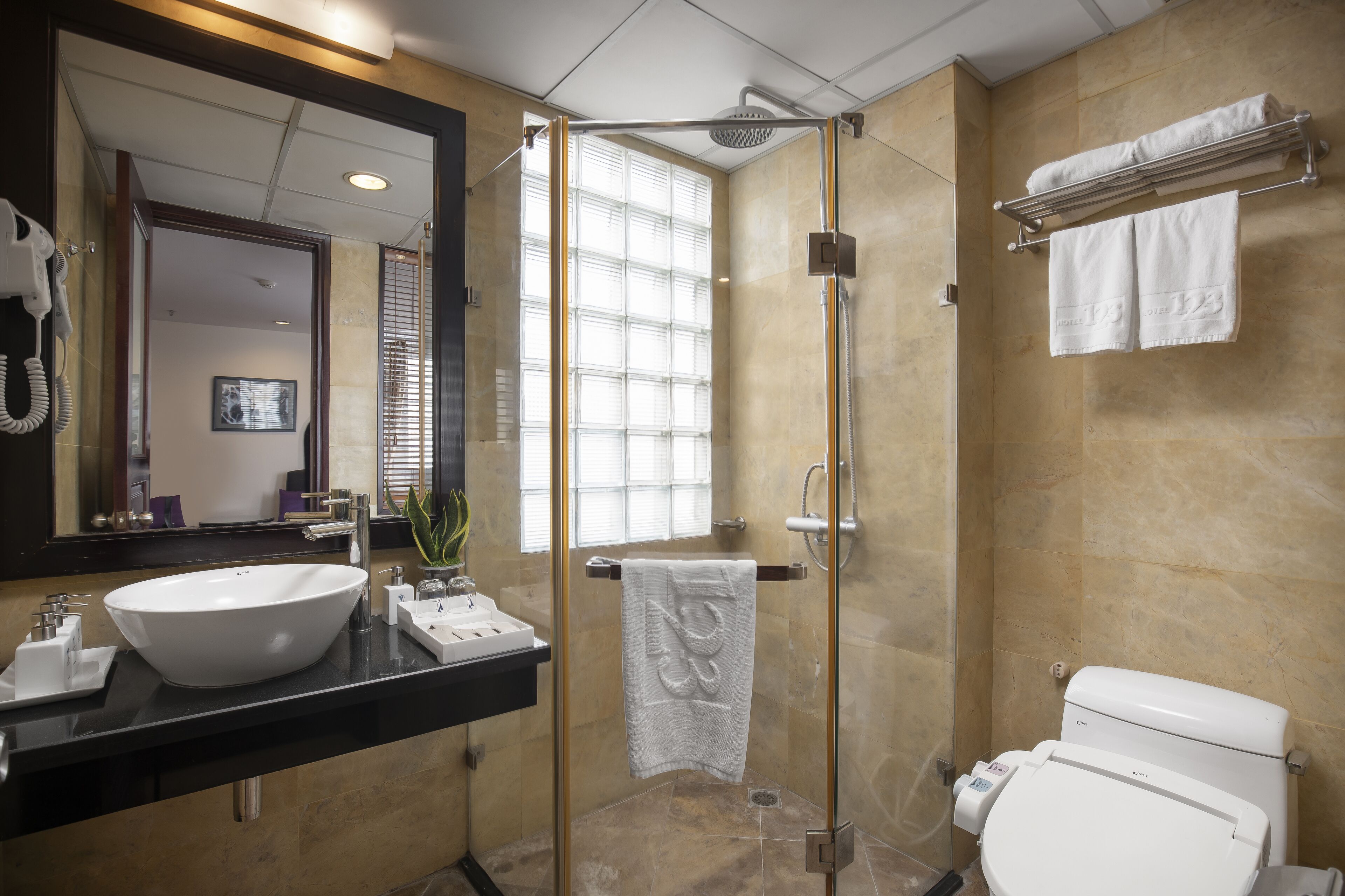 free toiletries, hair dryer, slippers, towels