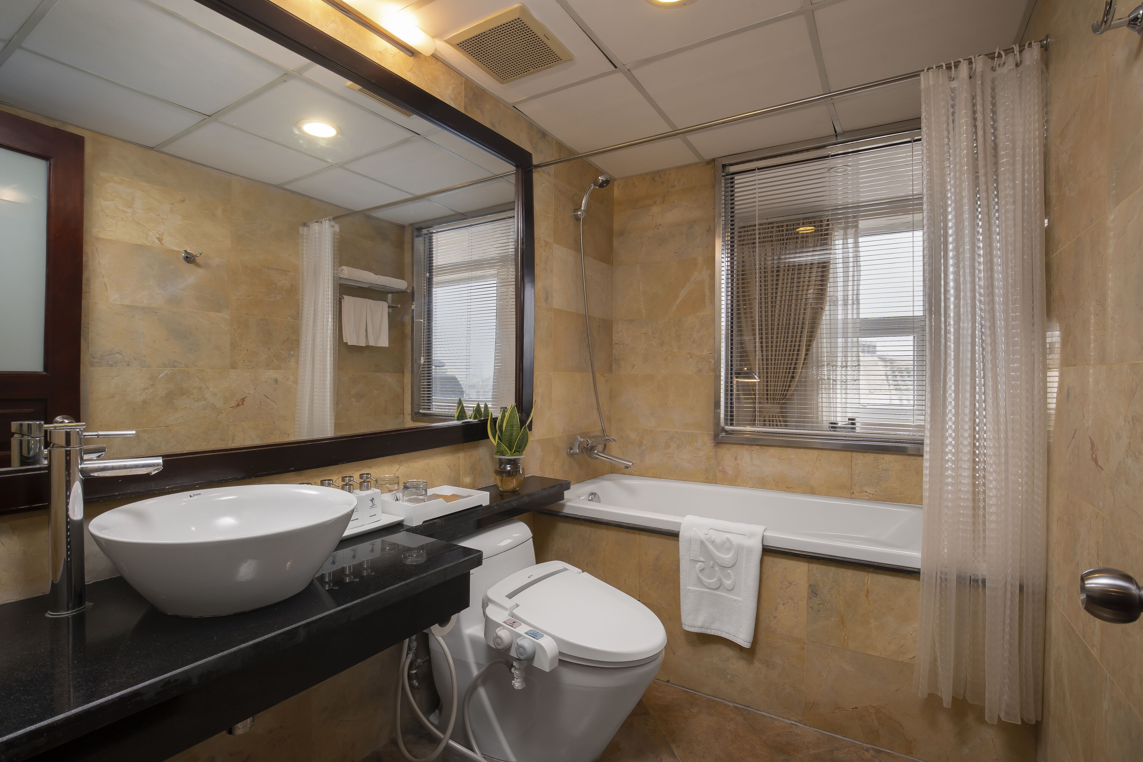suite (with bathtub) | bathroom | free toiletries, hair dryer, slippers, towels