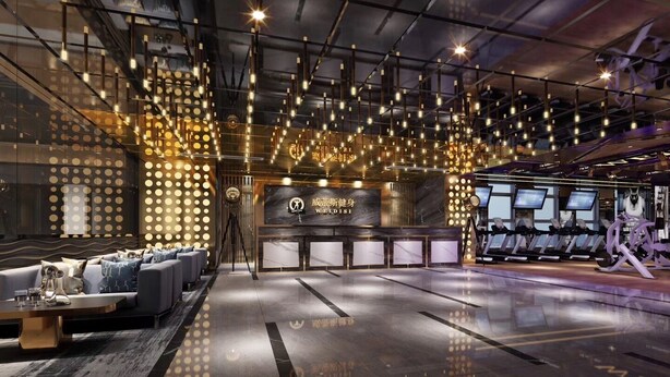 A modern fitness center with a reception desk, exercise equipment, and a seating area with sofas.
