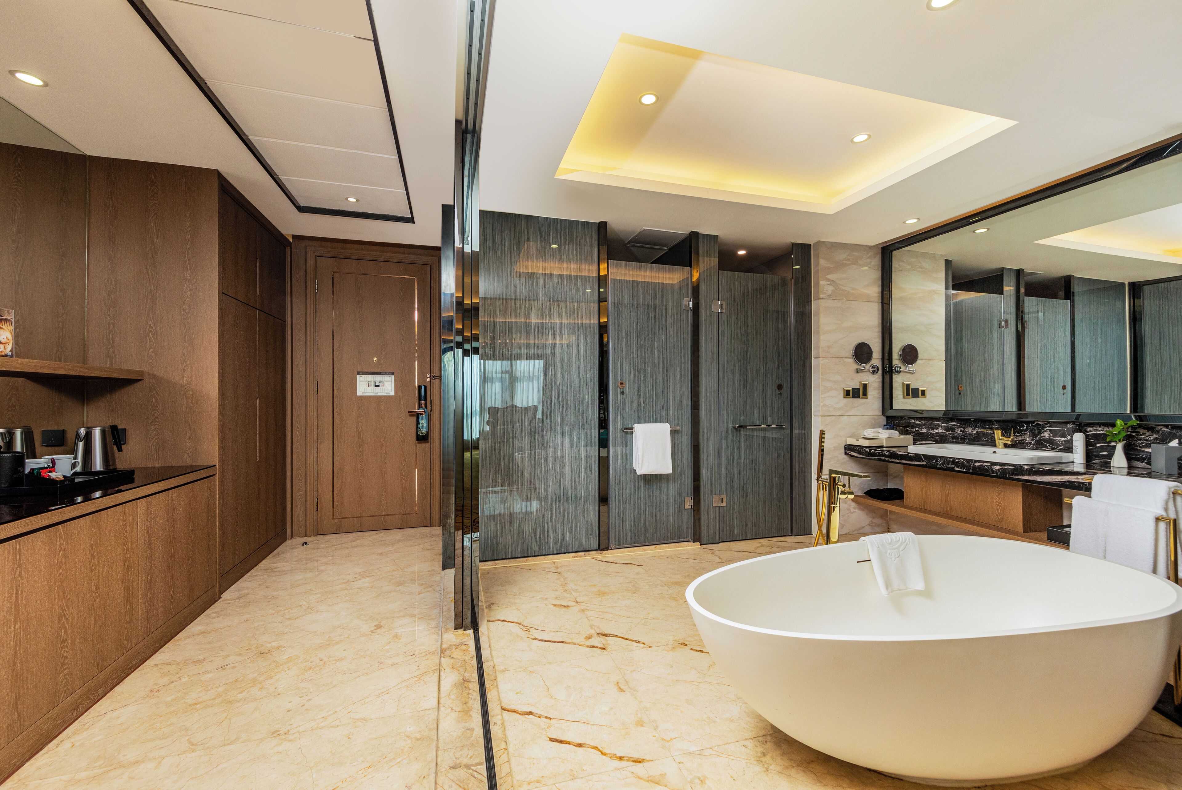 premier suite | bathroom | designer toiletries, hair dryer, bathrobes, slippers