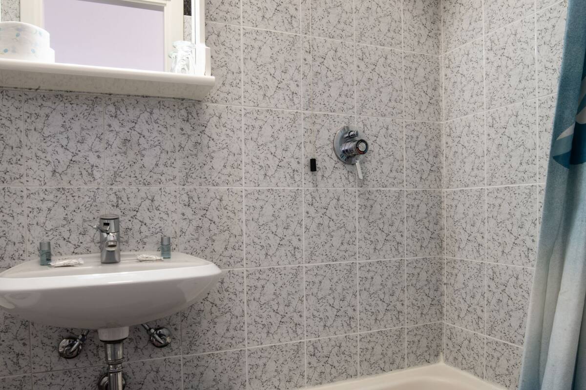 twin room, 2 single beds, private bathroom, ocean view | bathroom | shower, rainfall showerhead, free toiletries, hair dryer