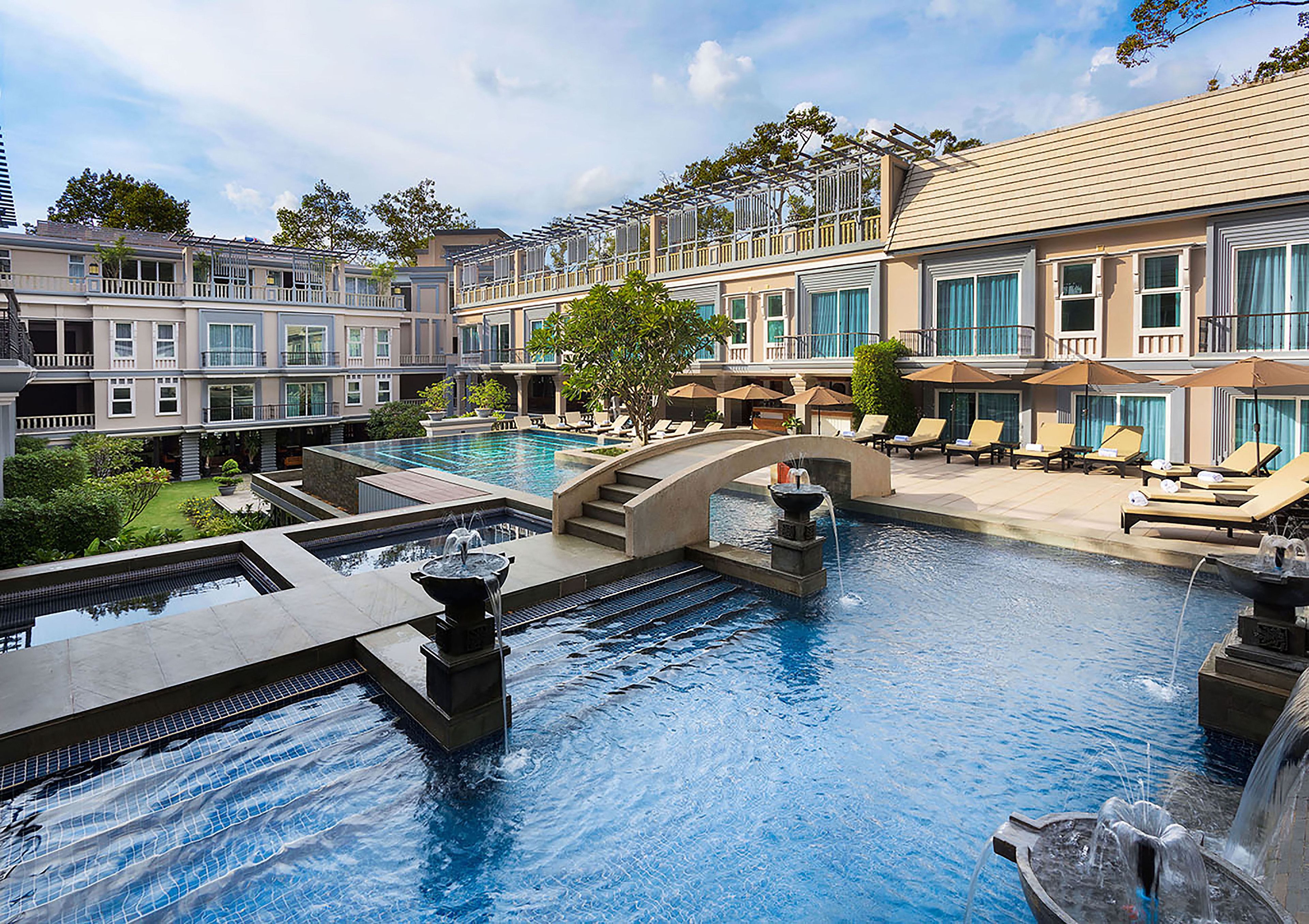 Outdoor pool, open 6:00 AM to 9:00 PM, pool umbrellas, pool loungers