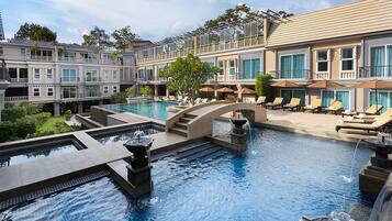 Outdoor pool, open 6:00 AM to 9:00 PM, pool umbrellas, pool loungers