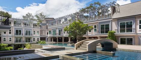 Outdoor pool, open 6:00 AM to 9:00 PM, pool umbrellas, sun loungers