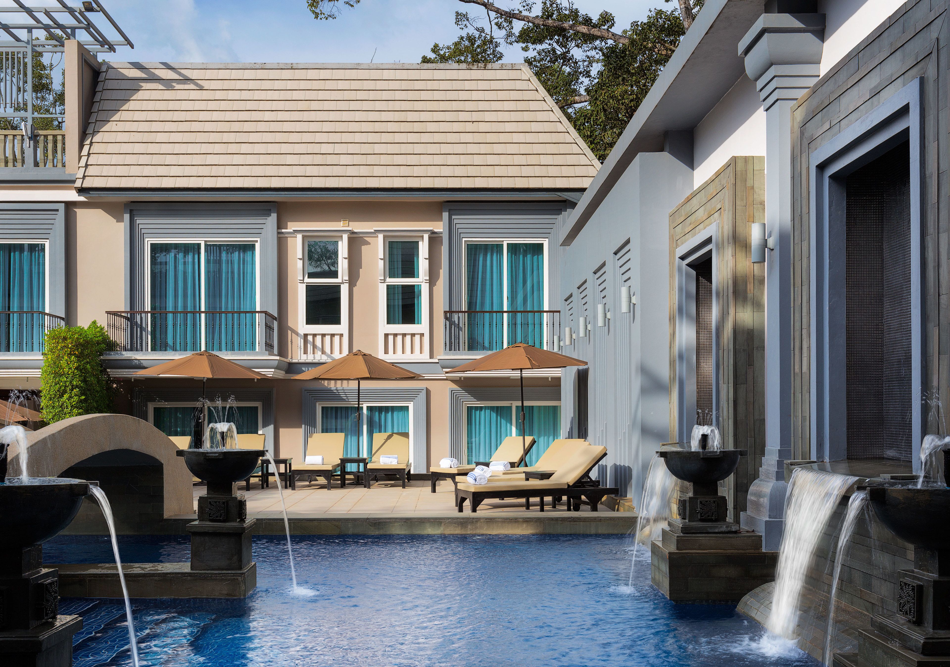 outdoor pool, open 6:00 am to 9:00 pm, pool umbrellas, pool loungers