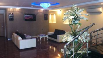 Coin salon dans le hall