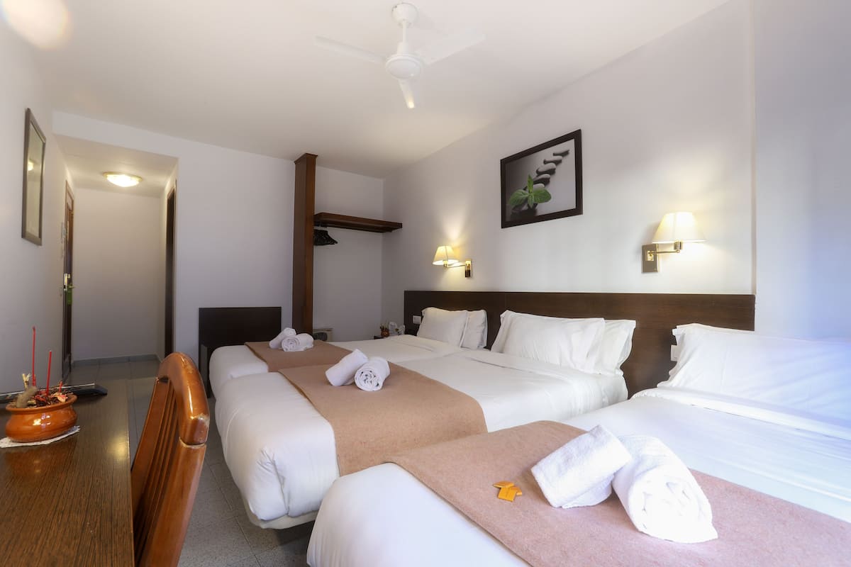 Double room with extra bed | In-room safe, desk, blackout curtains, soundproofing