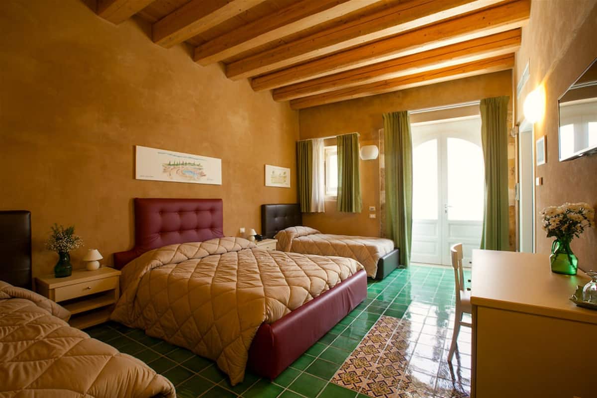 Quadruple Room | Premium bedding, minibar, in-room safe, desk