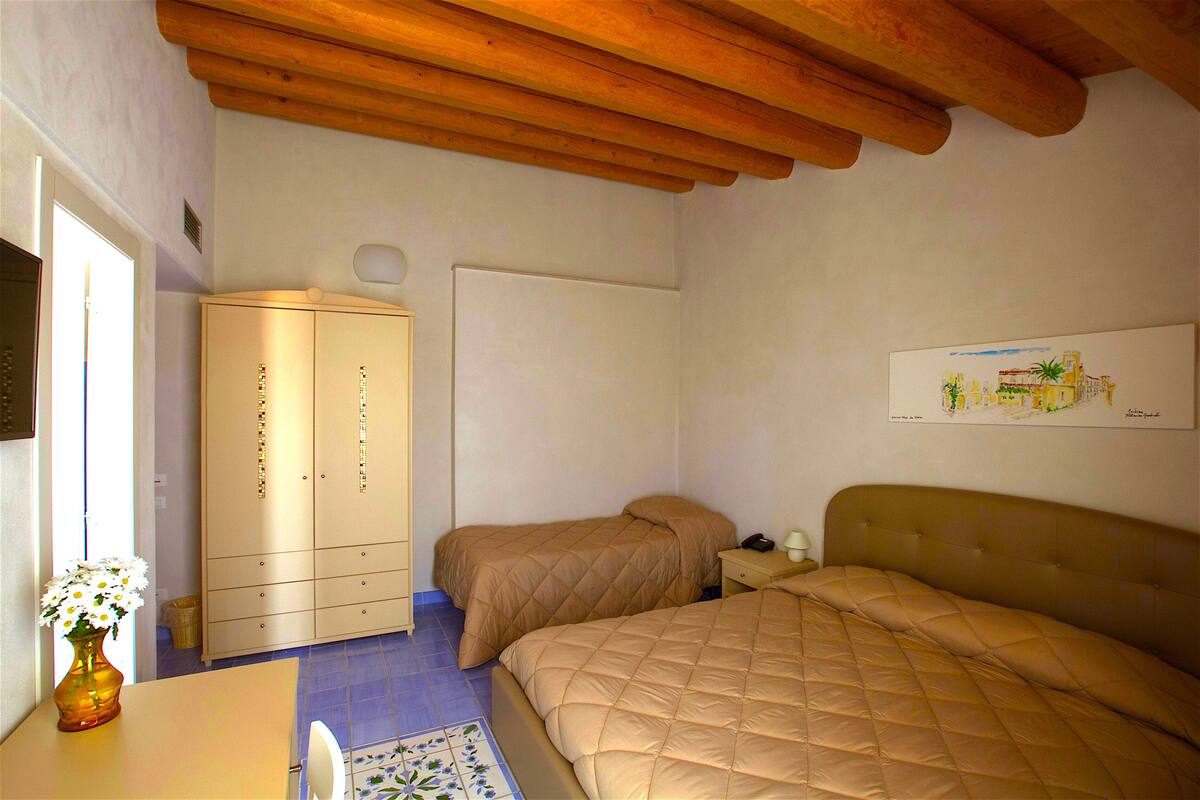 Triple Room, Balcony | Premium bedding, minibar, in-room safe, desk