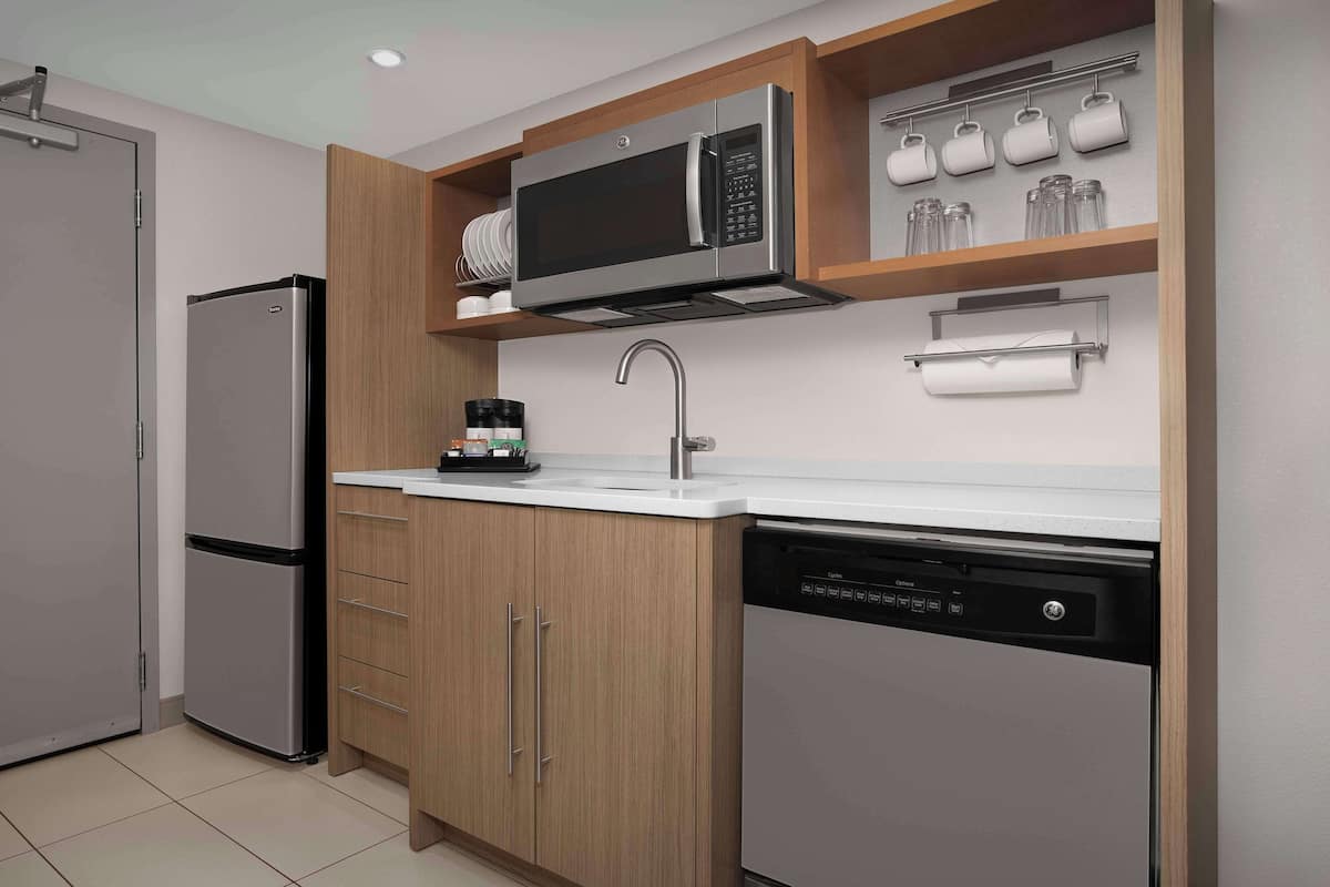 full-sized fridge, microwave, dishwasher, coffee/tea maker