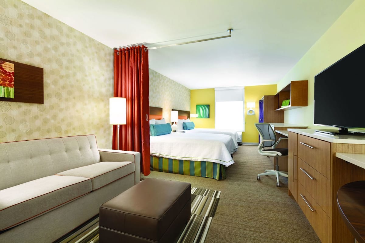 Premium bedding, pillowtop beds, desk, laptop workspace