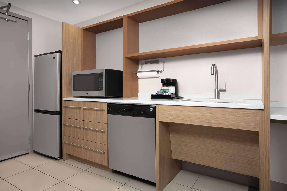 full-sized fridge, microwave, dishwasher, coffee/tea maker