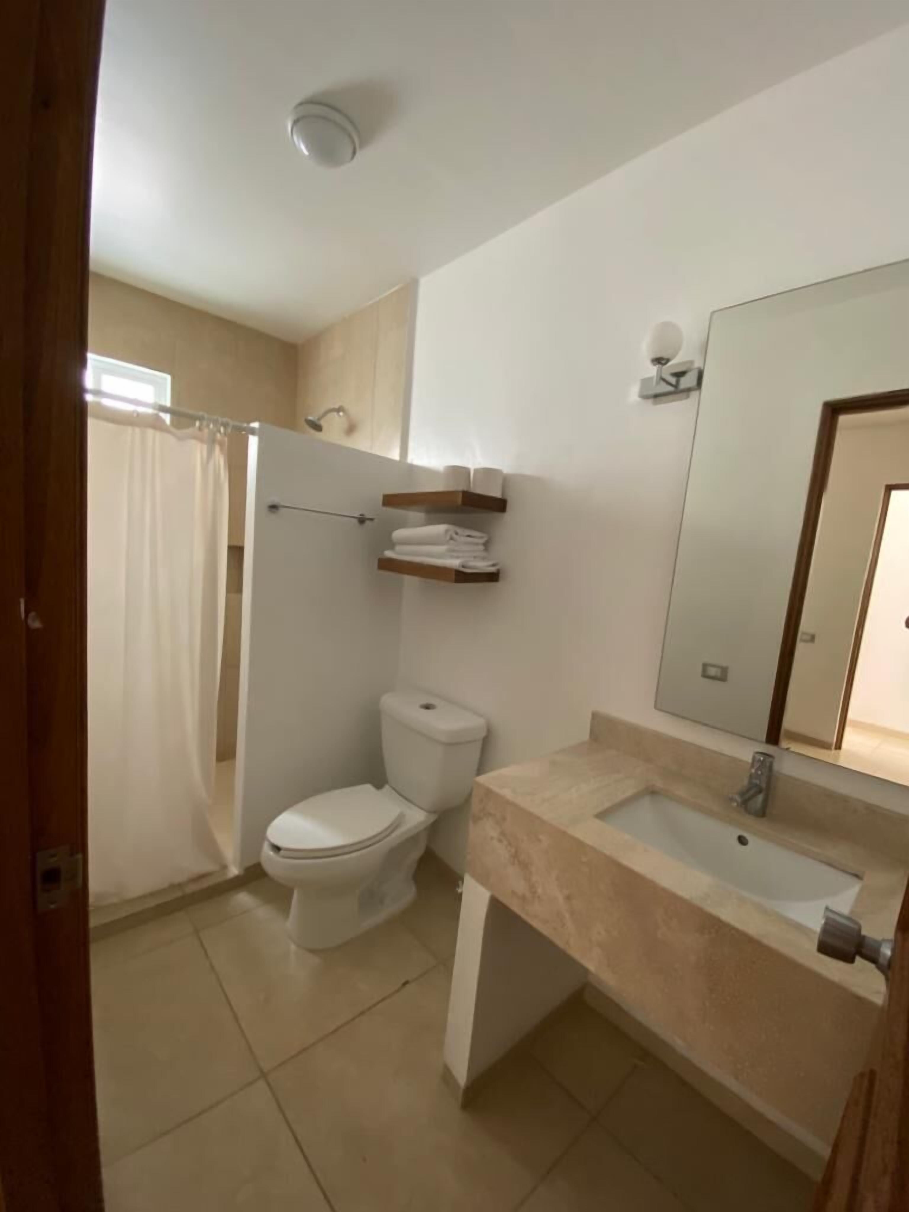 suite | bathroom | shower, free toiletries, towels