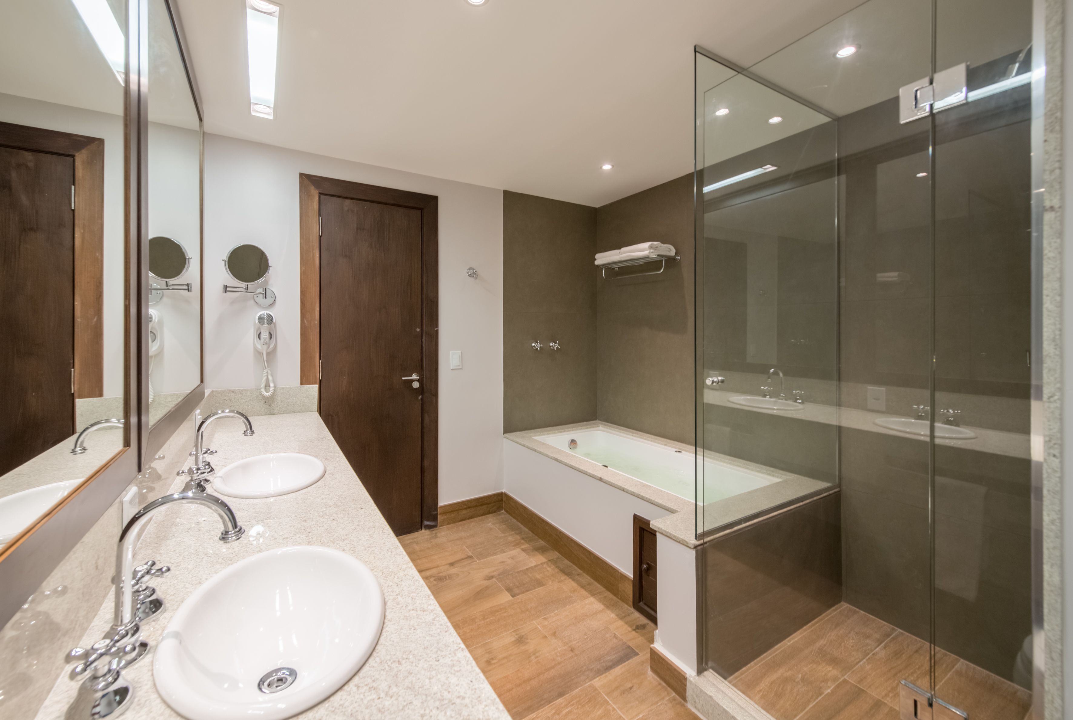 junior suite | bathroom | shower, rainfall showerhead, free toiletries, hair dryer