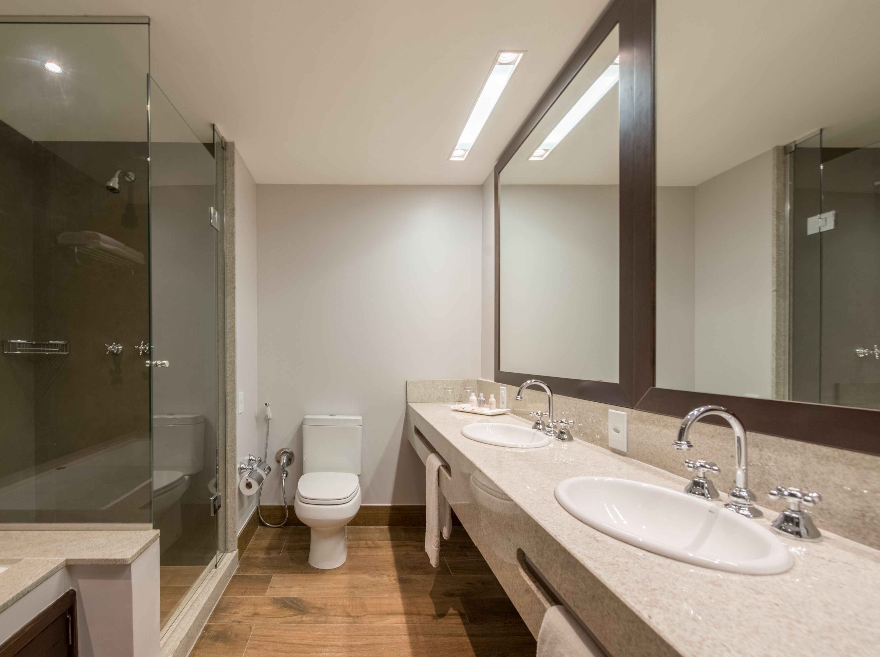 junior suite | bathroom | shower, rainfall showerhead, free toiletries, hair dryer