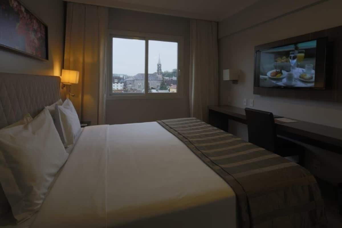 Superior Vista Igreja | Minibar, odada kasa, masa, dizüstü bilgisayar çalışma alanı