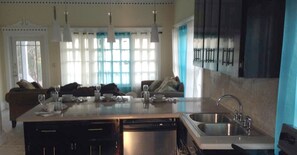 Superior Villa, 2 Bedrooms, Bay View, Oceanfront | Private kitchenette | Fridge, microwave, oven, stovetop