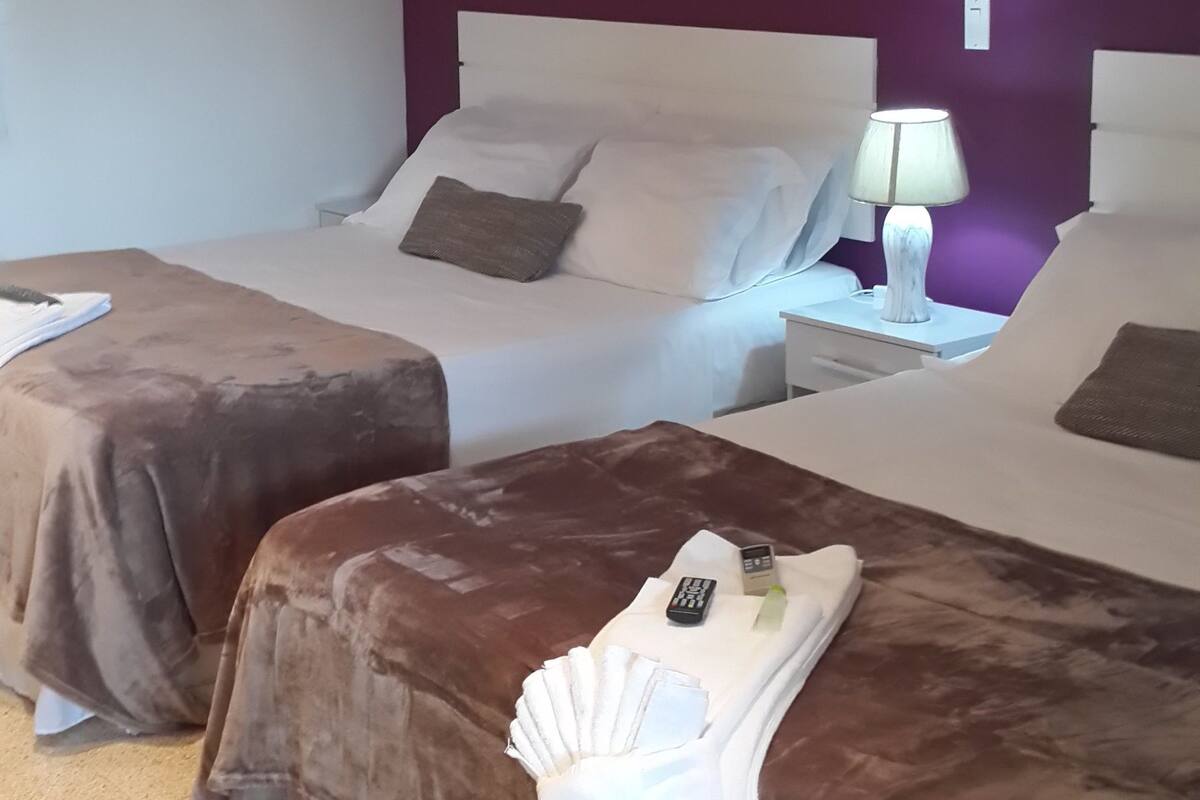 Quadruple Room, 2 Queen Beds, Private Bathroom | Iron/ironing board, free WiFi