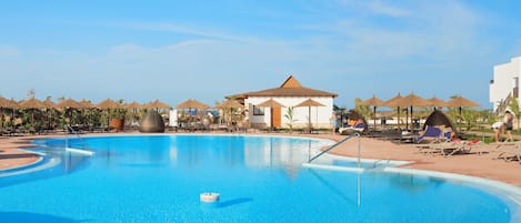 2 outdoor pools, pool umbrellas, pool loungers
