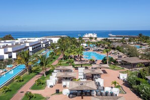 A resort with a large swimming pool, beach area, and ocean views. - Melia Llana Beach Resort & Spa - All Inclusive - Adults Only (Sal)