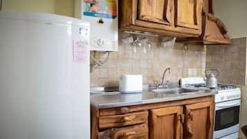 Fridge, oven, cookware/dishes/utensils
