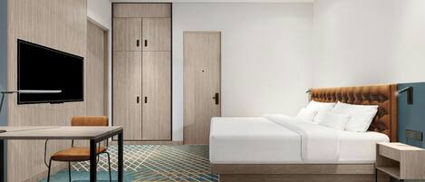 Una habitación de hotel moderna con cama, escritorio, silla, televisor y armarios empotrados.