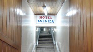 A staircase leading to a sign that reads "HOTEL AVENIDA". - Hotel Avenida (Vitoria)