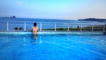 Outdoor pool, pool umbrellas, pool loungers