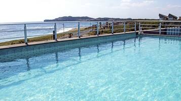 Outdoor pool, pool umbrellas, pool loungers