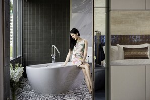 One Bedroom Family Suite (24 Hours Use of Room) | Bathroom | Free toiletries, hair dryer, bathrobes, slippers