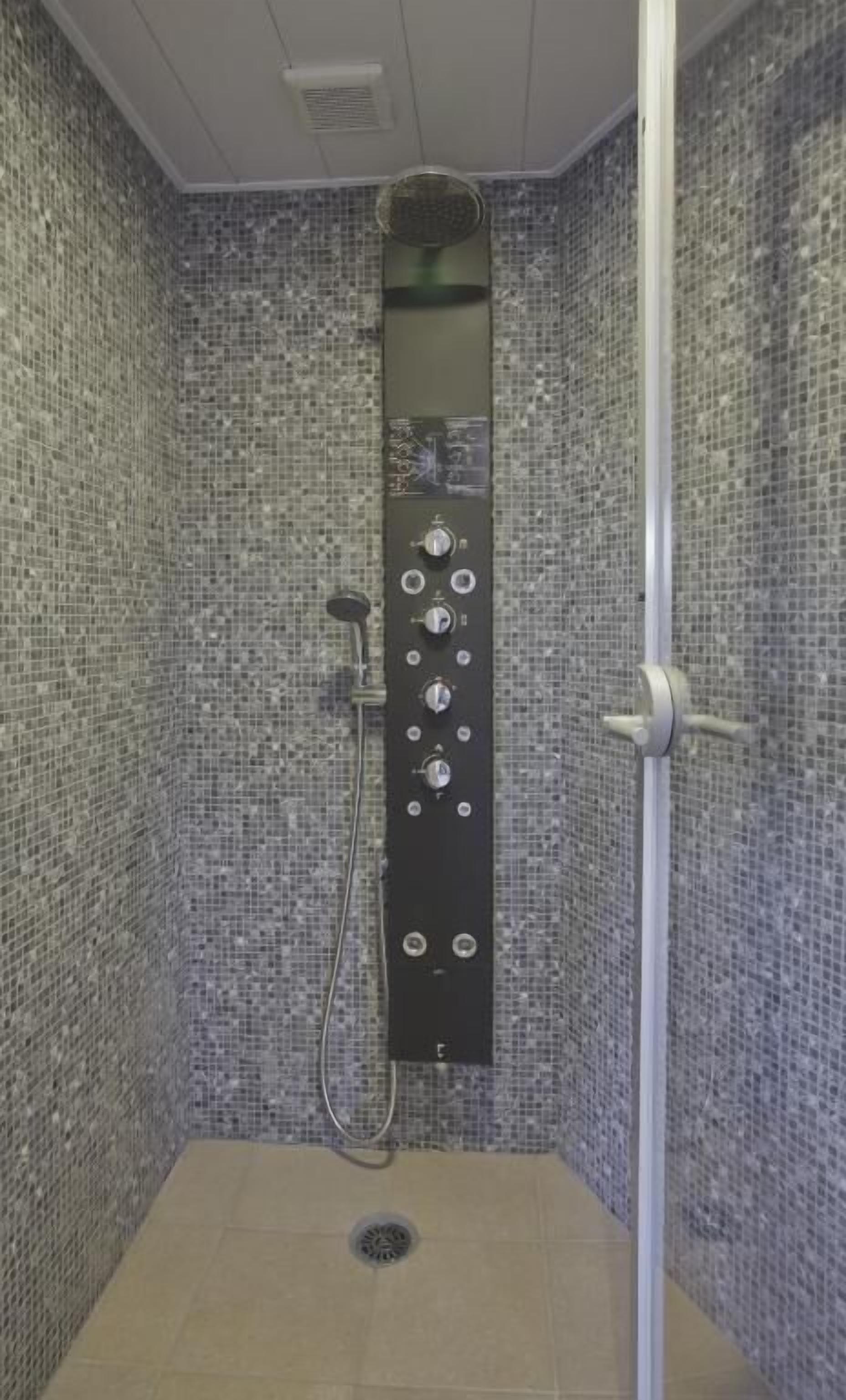 shower, hair dryer, slippers, bidet