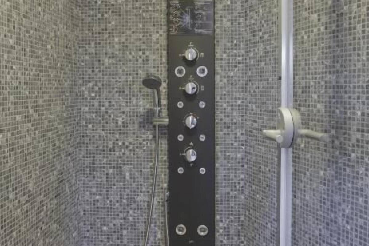 shower, hair dryer, slippers, bidet