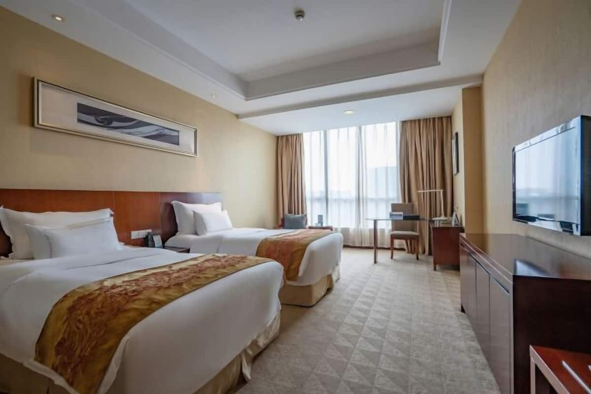Ropa de cama de alta calidad y minibar